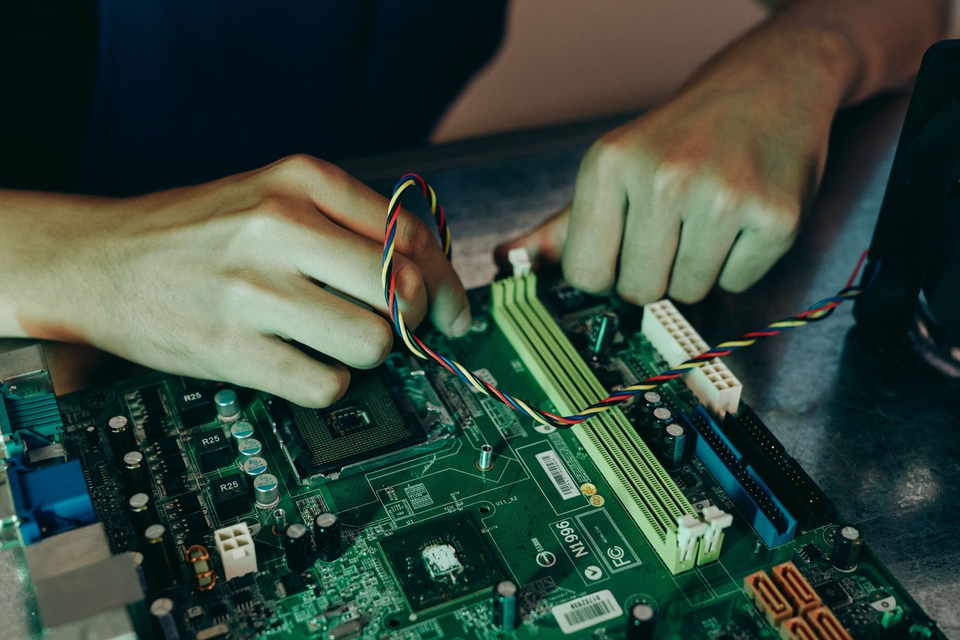 Engineer wiring a circuit board